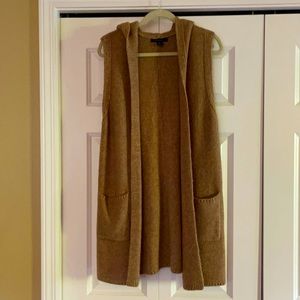 Sleeveless, hooded Tahari sweater.